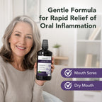 Woman holding ioRinse MR: gentle formula for rapid relief of oral inflammation, mouth sores and dry mouth